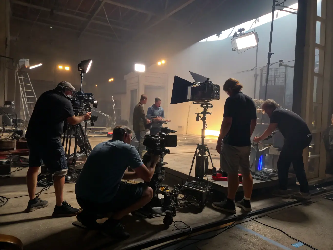 A behind-the-scenes image of a film production project, showing a diverse crew working together on set, highlighting collaboration and storytelling.